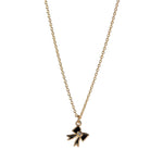 Dainty gold and black bow necklace with word remember on back