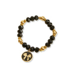 Gold and Black beaded bracelet with gold bow charm, word Remember on back of charm